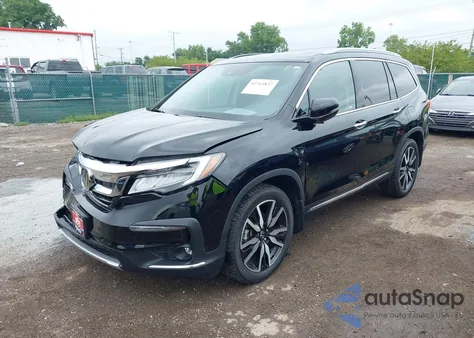 2019 Honda Pilot Touring z USA, uszkodzony, nr VIN 5FNYF6H93KB013191